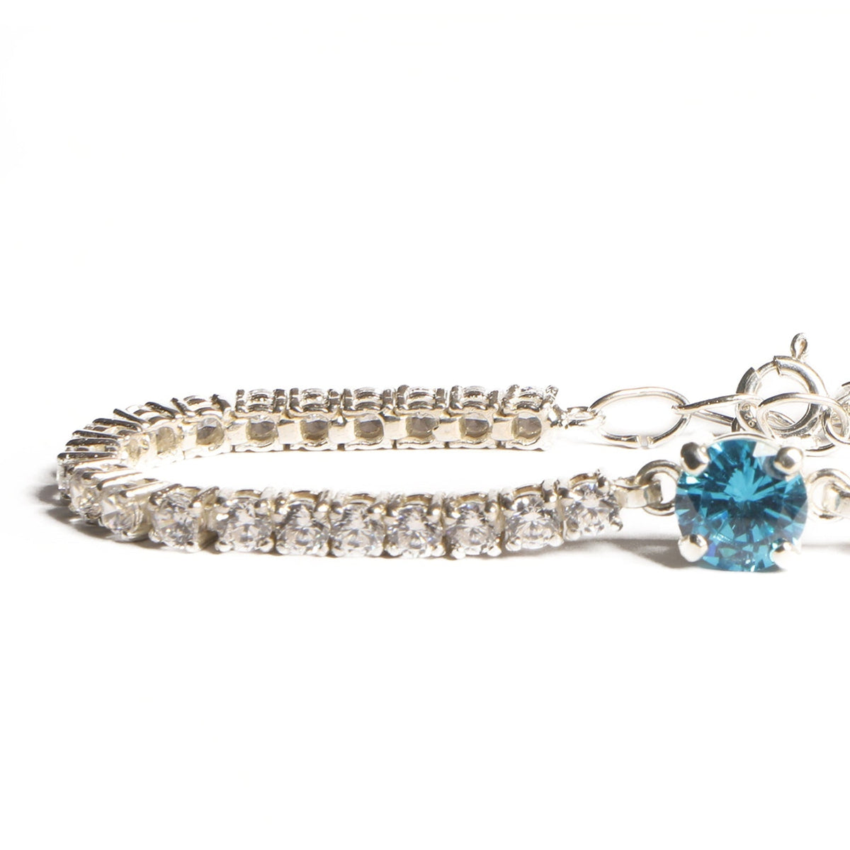 Elegant Silver Tennis Bracelet with Blue Crystal Centerpiece